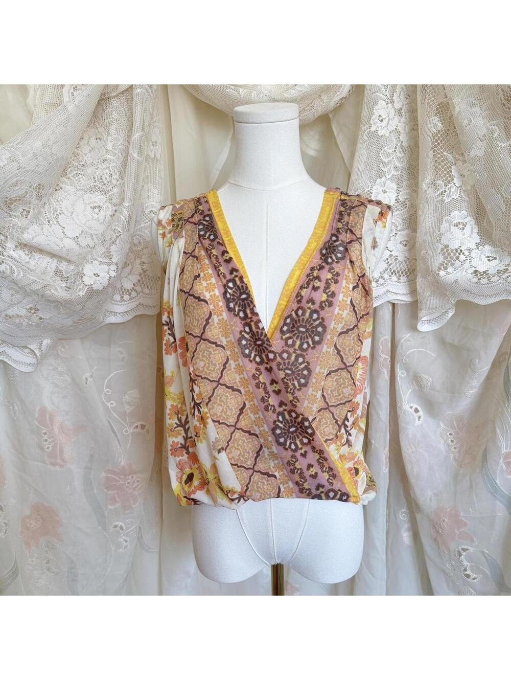 SOLD Free People flowy sleeveless blouse